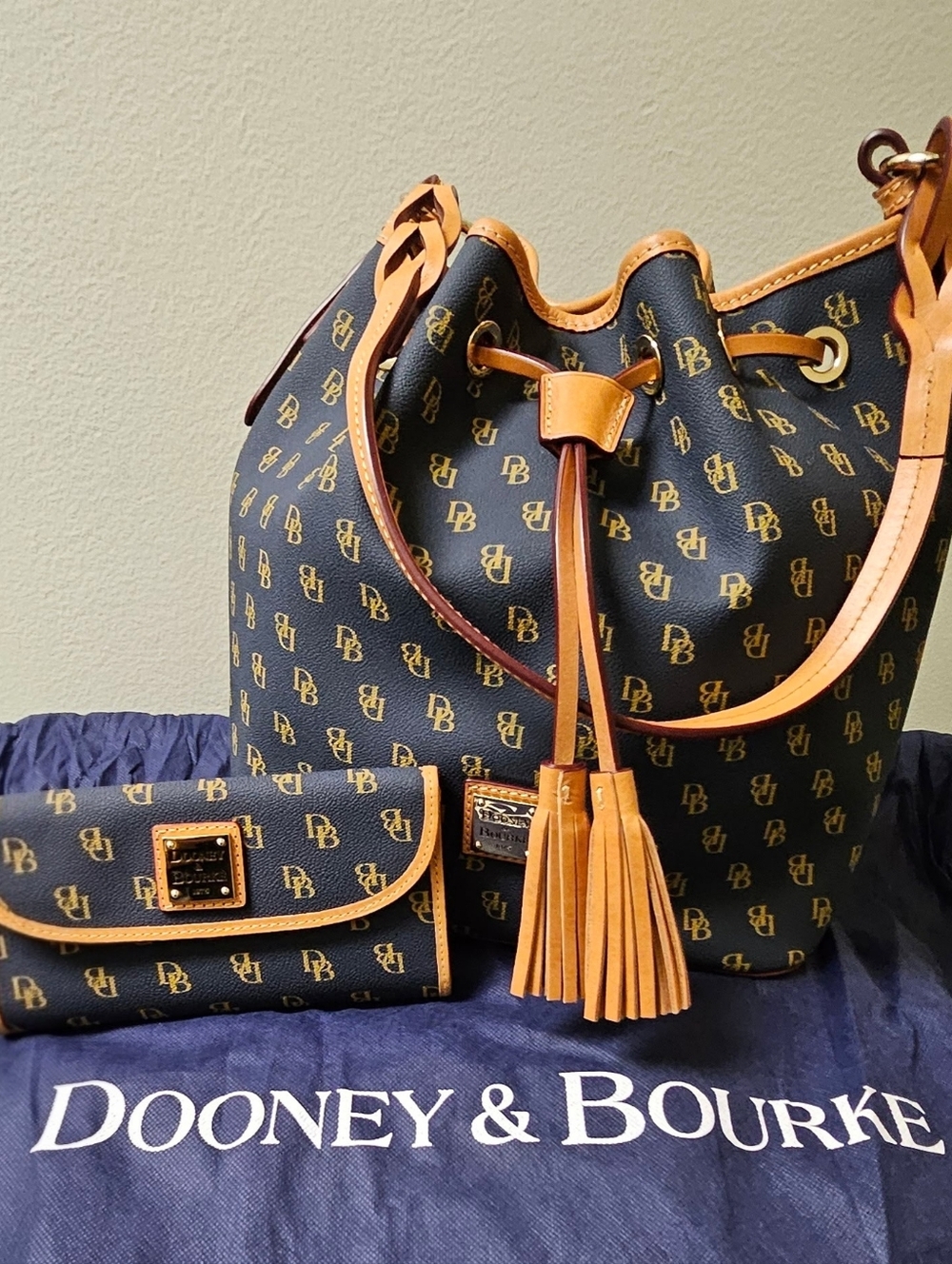 Dooney & Bourke Navy Blue and Tan Logo Drawstring Bucket Bag with Tassel W/Bag